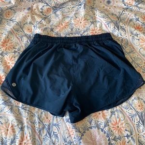 Navy blue lululemon Hotty hot shorts, size 8 tall